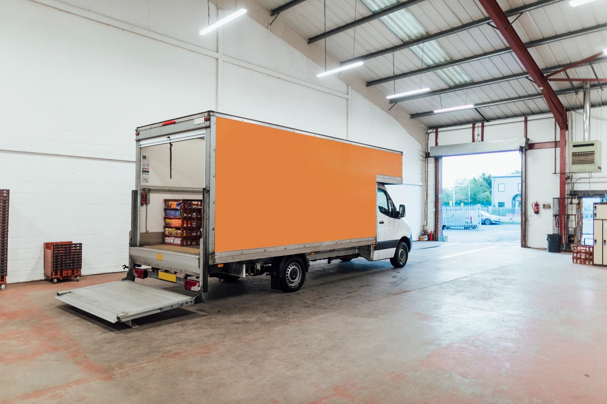 Goods vehicle at warehouse loading area